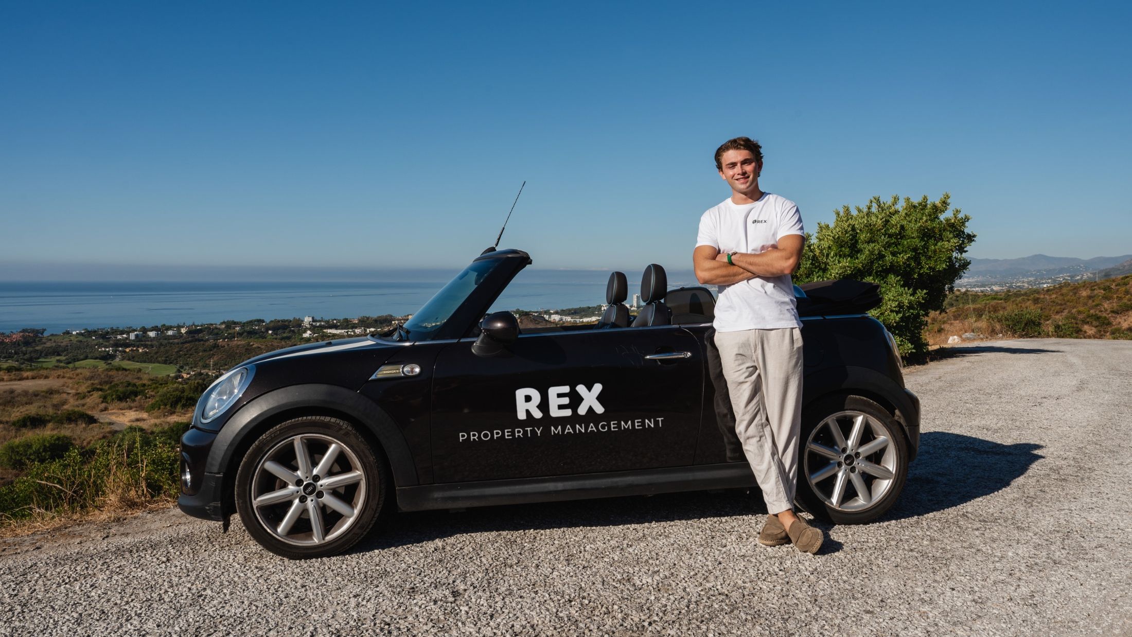 Daan Tiné, founder of REX, next to the REX car above the Costa del Sol